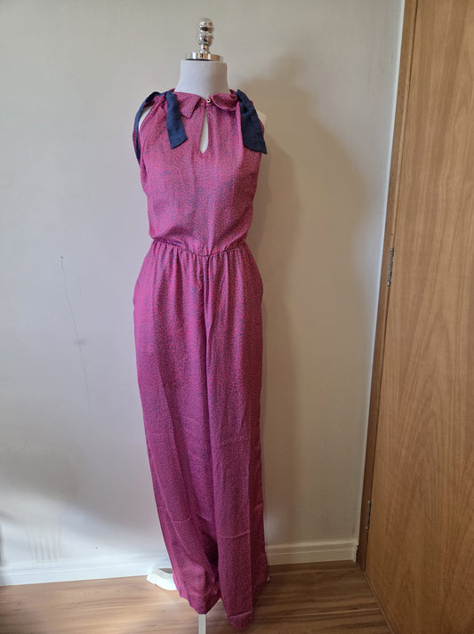 Macacão Antix Pantalona Rosa e Flor Azul