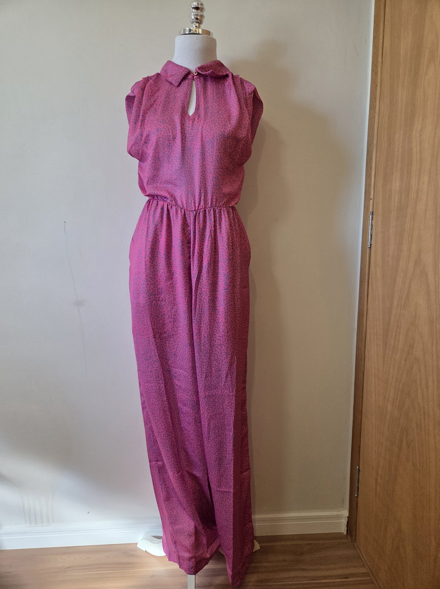 Macacão Antix Pantalona Rosa e Flor Azul