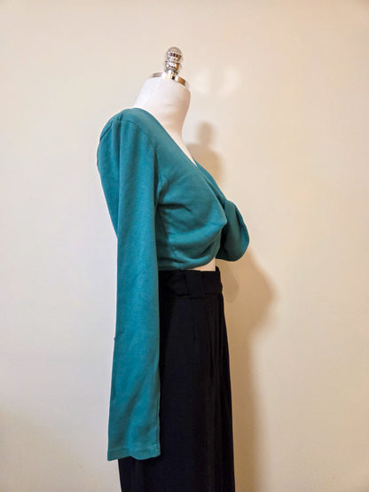 Blusinha Nati Vozza Verde Manga Longa com Torção Frontal