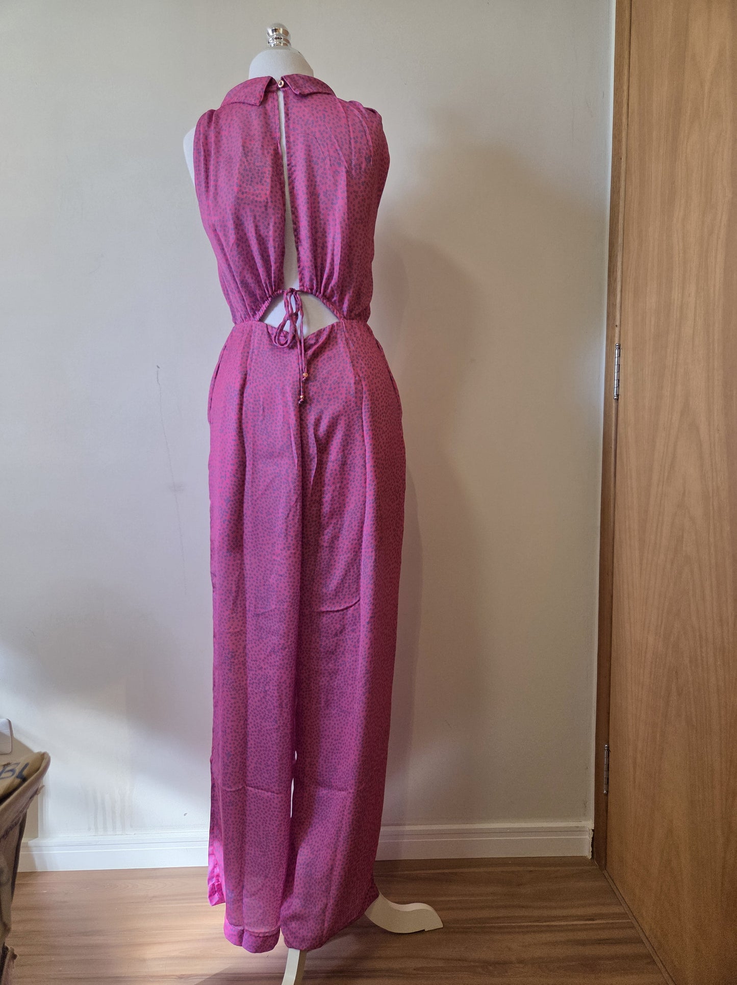 Macacão Antix Pantalona Rosa e Flor Azul